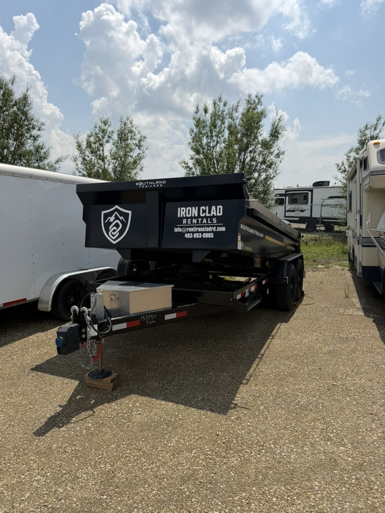 Iron Clad Rentals branded dump trailer front view